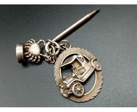 Part of a Vintage Sterling Silver Charm Bracelet. Includes a mini pencil holder. 12.5g.