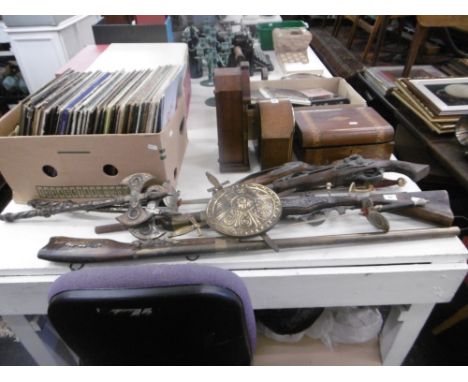 Four reproduction muskets, axe, sabre and two fencing swords