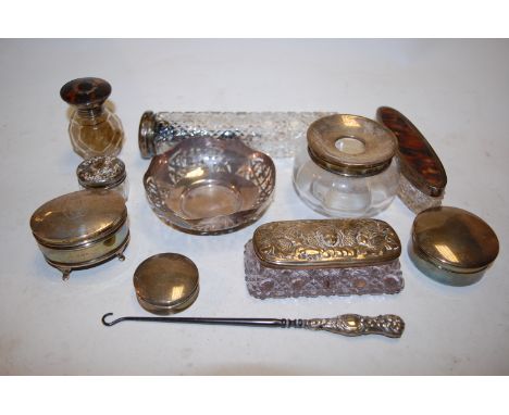 Assorted silver topped dressing table wares to include; hat pin jar, hair tidy, silver ring box, silver handled button hook, 