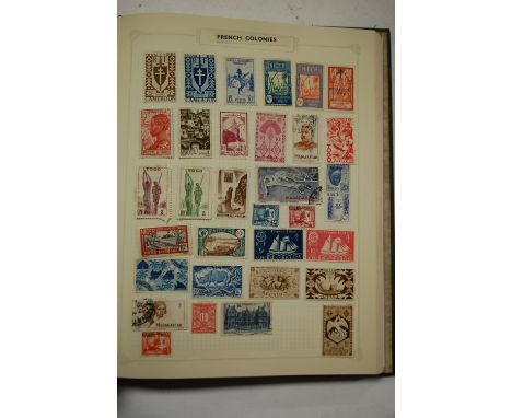 An Acme postage stamp album and contents to include mostly world examples together with various first day covers