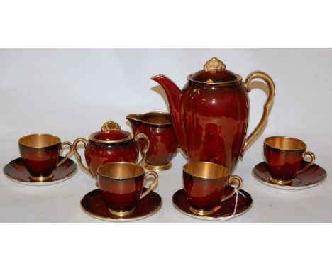 A mid-20th century Carltonware Rouge Royal four piece teaset, having gilt interior (a/f)