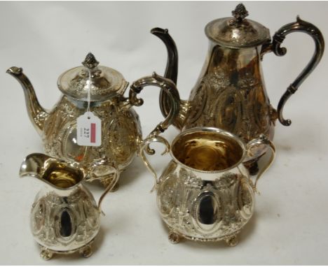 A Victorian silver plated four piece tea and coffee service, each engraved with various leaves and flowers with vacant cartou