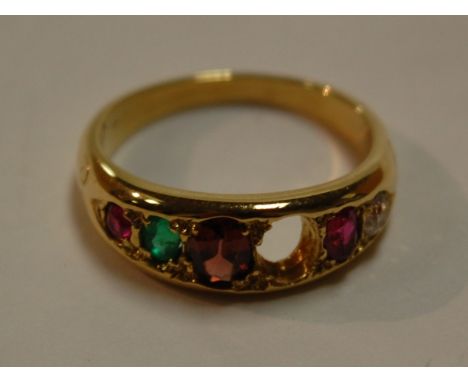 A yellow metal ladies 'REGARD' ring, set with a single ruby, emerald, garnet, amethyst, ruby and diamond, size N-