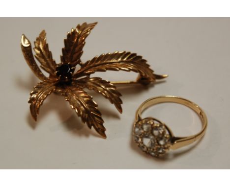 A 9ct gold and paste set cluster ring together with a modern 9ct gold and garnet set leaf brooch (2)