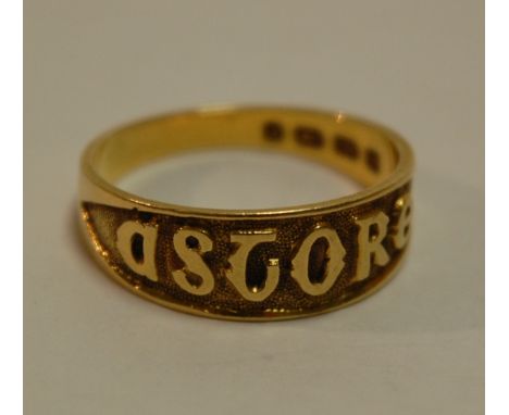 An 18ct gold and embossed band ring, 4.2g