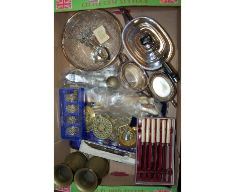 A box of miscellaneous metalware to include; silver plated three piece tea service by Garrard & Co, horse brasses, loose flat