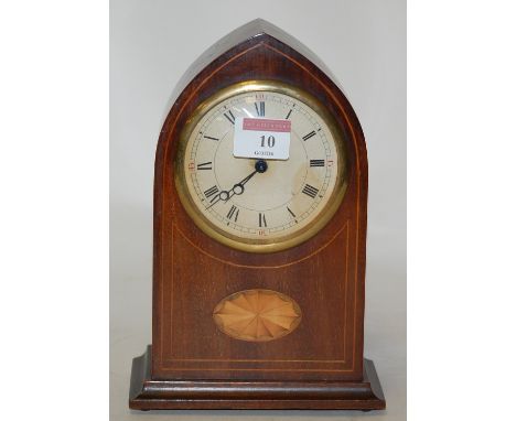 An Edwardian mahogany and satinwood inlaid cased lancet shaped mantel clock, having painted dial with Roman numerals, and cyl