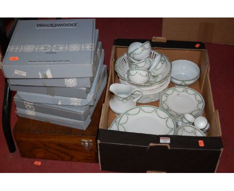 A mid-20th century oak cased table-top gramophone; together with various boxed Wedgwood collectors plates, and part tea and d