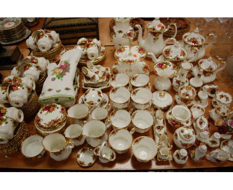 An extensive Royal Albert tea and dinner service, in the Old Country Roses pattern