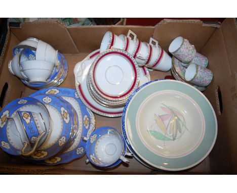 A box of miscellaneous tea and dinner wares to include; Crown Staffordshire coffee cans and saucers, Susie Cooper Crown Bursl