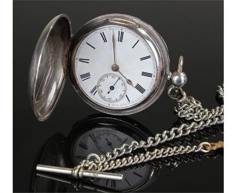 Silver hunter pocket watch, white enamel dial, silver chain attached