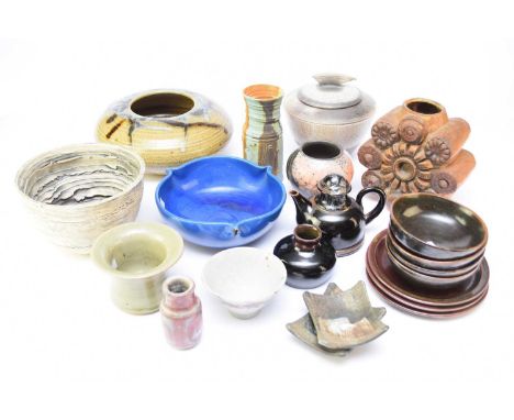 A collection of studio ceramics including a set of four Winchcombe pottery tenmoku glazed bowls and stands, 13cm and 17.5cm d