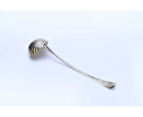 A George III silver soup ladle, Samuel Wintle, London 1783, with shell moulded bowl and decorative engraved handle, 36cm long