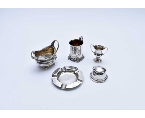 A small collection of silver, comprising; a George IV silver cream jug, London 1822, a Victorian Christening mug, Sheffield 1