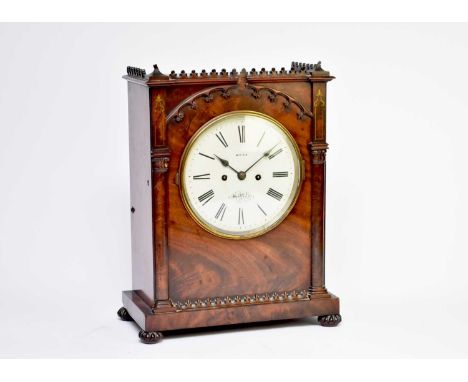 An early Victorian, Gothic style, mahogany bracket clock, by 'Moss, Sheffield', the top with a crocketed gallery above an arc