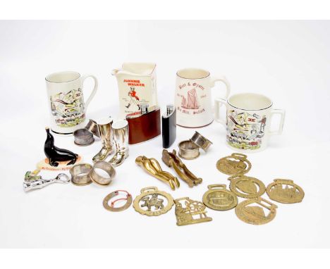 An assembled group of breweriana to include: A Carltonware Guninness seal figure; Wade Johnny Walker water jug; Burleigh Ware