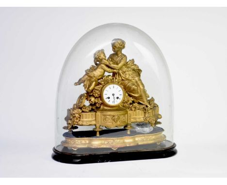 A French gilt metal figural mantel clock, late 19th century, the neoclassical case surmounted by a maiden and putti and raise