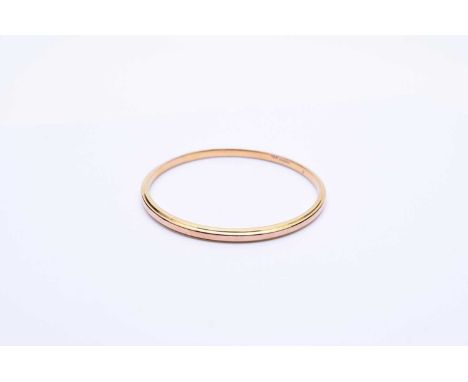 A 9ct gold slave bangle, Smith &amp; Pepper Ltd, Birmingham 1924, inner diameter approx 76mm, weight approx 6.8g