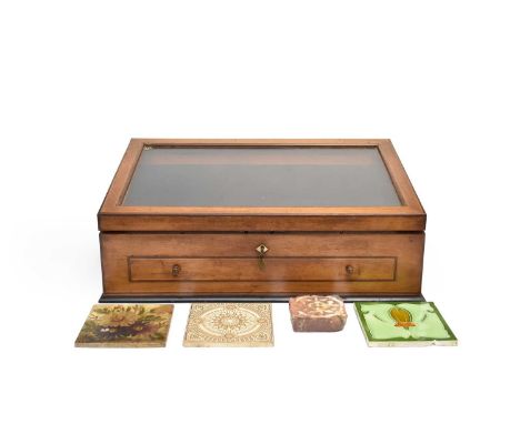 An early 20th century inlaid mahogany counter-top display cabinet, the sloping glazed top edged in rosewood and boxwood strin