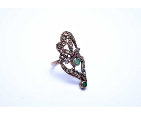 A yellow metal emerald, ruby and rose cut diamond ring, of decorative scroll design, ring size O 1/2, not stamped, weight app