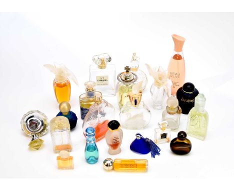 A collection of assorted perfume bottles, including Chanel No 5 100ml and Libertine; together with assorted scent bottles, in