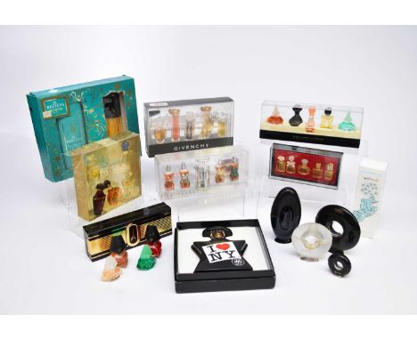 A group of perfume and scent display bottles, including Paloma Picasso (full-size and tester) three Salvador Dali lips tester