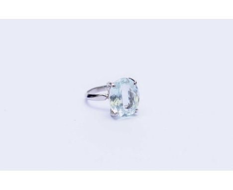 A single stone aquamarine ring, the oval mixed cut aquamarine measures approx 13.5mm x 11mm x 7mm deep, the white metal shank