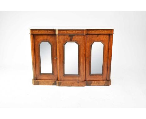 A 19th century inlaid walnut marble topped credenza, the shaped white marble top above a frieze inlaid with foliate patera an