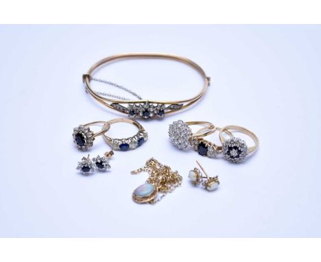 Three 9ct gold sapphire rings, together with a 9ct gold blue and white stone set ring, a yellow metal cubic zirconia cluster 