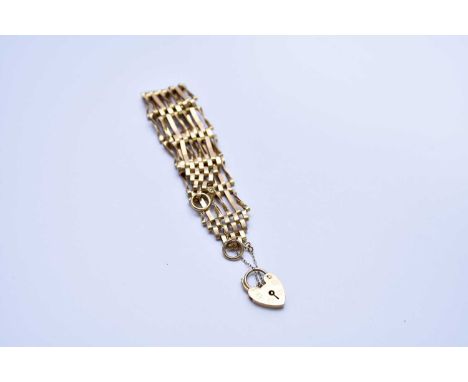 A 9ct yellow gold gate link bracelet, with heart shaped padlock clasp, weight approx 12.9g