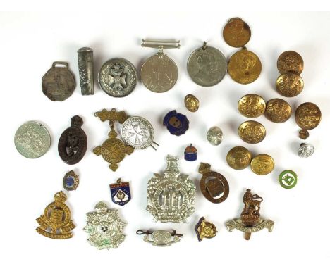 A collection of assorted medals to include a 1939-45 Defence Medal, an 11th Infantry Brigade Football Tournament medal awarde