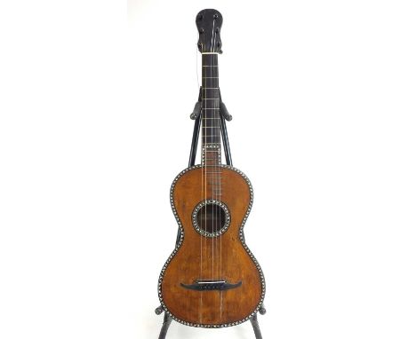 A late 18th century small-bodied parlour guitar by Francois Roudhloff, with ebony neck and fretboard, spruce top with maple b