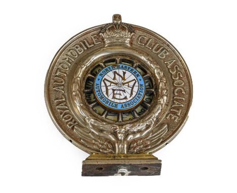 Alkerton &amp; Co: A Silver Plated Royal Automobile Club Associate Car Mascot, no.N132 and enamelled North Eastern Automobile