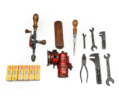 A Motor Mechanic’s Mechanical Hand Drill, with turned wooden handle; A Flat-Head Screwdriver; A No.93 Adjustable Spanner; A S