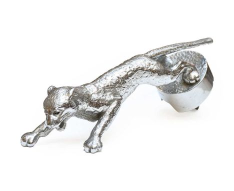 Desmo, A 1930's Jaguar Car Mascot, chrome on brass, with paws outstretched landing on a circular base stamped Desmo, 19cm lon