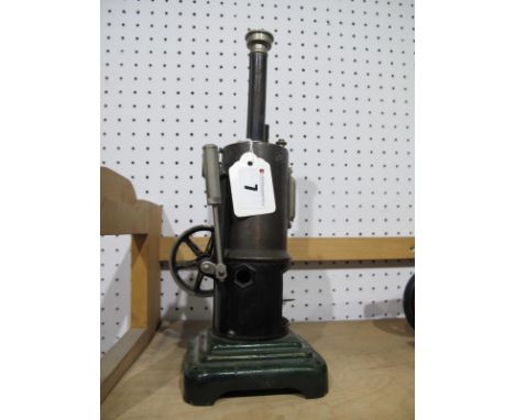 An Early XX Century Vertical Steam Engine, (German), with water sight glass, whistle, burner and funnel, single cylinder with