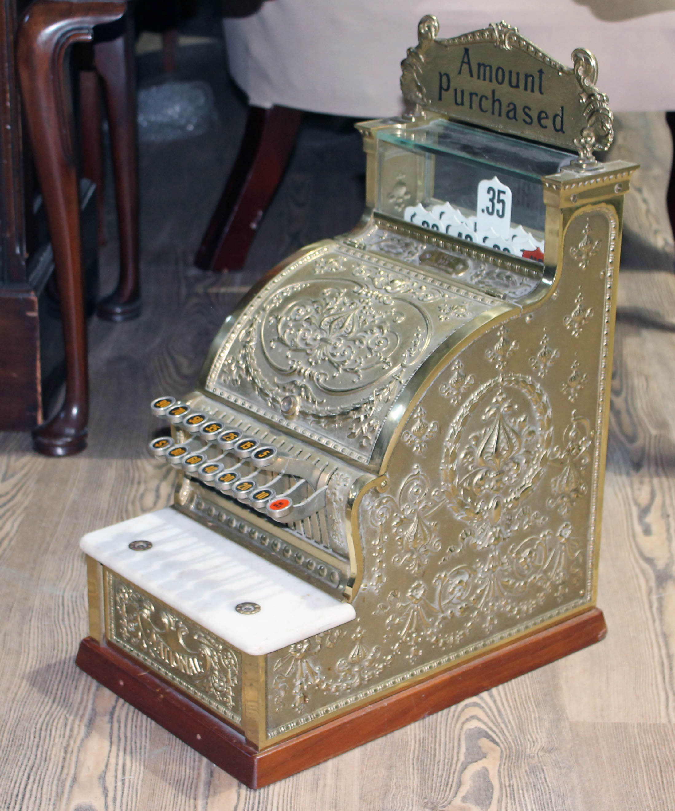 A reproduction National Cash register, height 52cm.