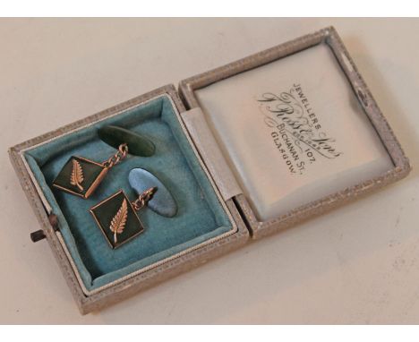 A pair of yellow metal and nephrite jade cufflinks marked /9c', gross wt. 7.8g.