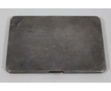 A hallmarked silver cigarette case with gilt interior, length 11.5cm, wt. 5 1/2oz.
