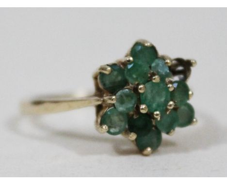 A hallmarked 9ct gold jade cluster ring, gross wt. 2.3g, size Q.