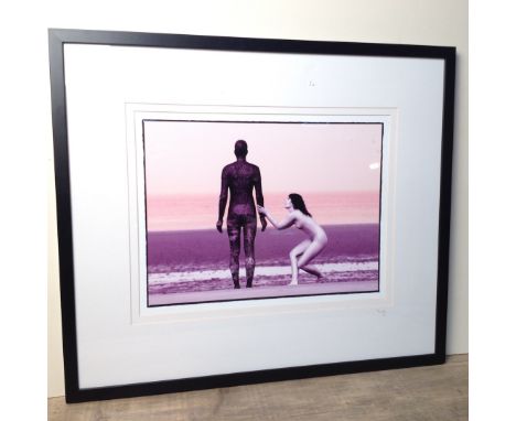 Stephanie Delange photographic print depicting a nude girl clutching on to Anthony Gormley's 'Another Place' Formby, nubered 