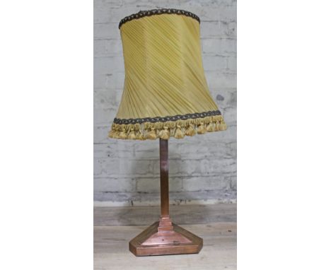 A triangular section copper lamp circa 1900, height (including shade) 66cm.