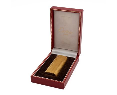 Cartier gold plated engine turned pocket lighter, No 63994 A, in original fitted box.
