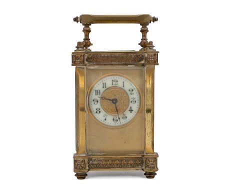 19th century brass cased carriage clock with bevelled glass panels, enamelled chapter ring with Arabic numerals set within a 