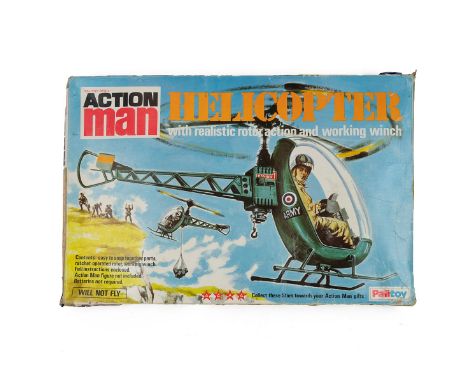 Boxed Palitoy Action Man helicopter and pilot, c1970. Box tatty. W 48cm, D 32cm, H 9cm.