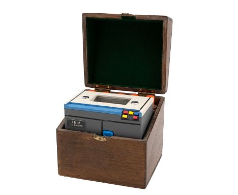 Novelty Table Lighter in the form of a scale model of an IBM 1132 printer. In wooden case with plaque inscribed 'Presented to