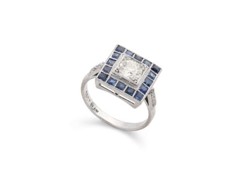  A sapphire and diamond cluster ring  Claw-set with an old round-cut diamond, in a square border set with square step-cut sap