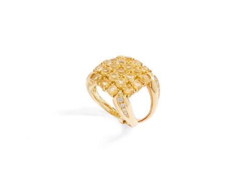  Gavello: A citrine and diamond dress ring  Claw-set with twenty-one round-cut citrines in an articulated setting, each shoul