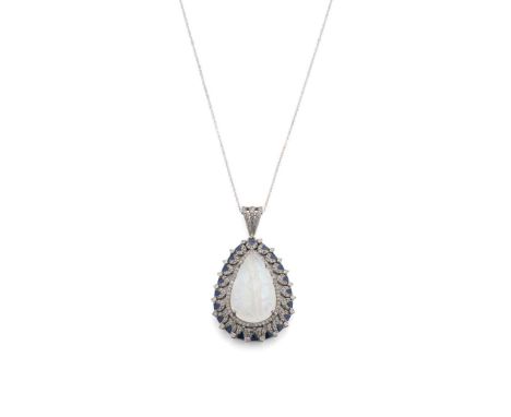  A carved moonstone, enamel and diamond pendant necklace  The pear-shaped moonstone, carved with floral detail, in a royal bl