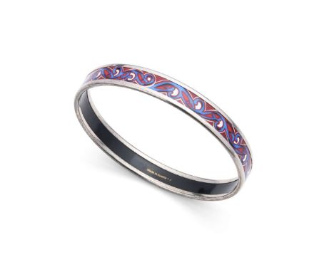  Hèrmes: An enamel bangle  With scrolling red, blue and white enamel detail, signed Internal width: 6.7cm   